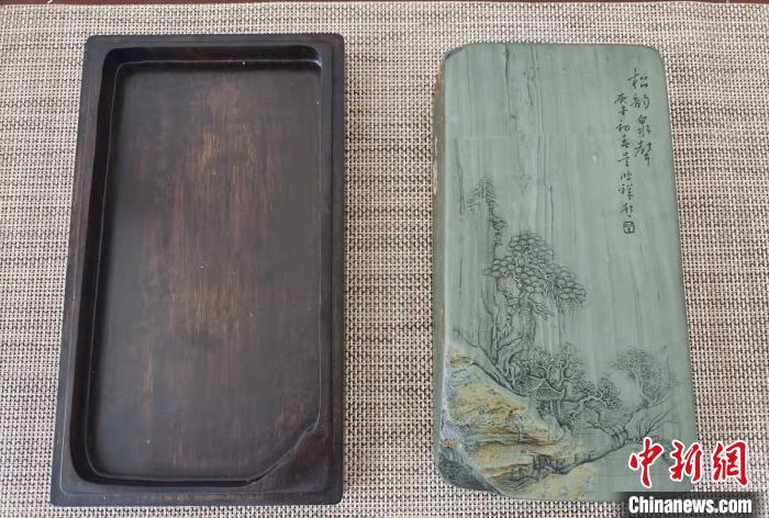 圖為盧保勝為提升洮硯文化內(nèi)涵，制作“一硯一銘、一盒一拓”成品展示?！堟?攝
